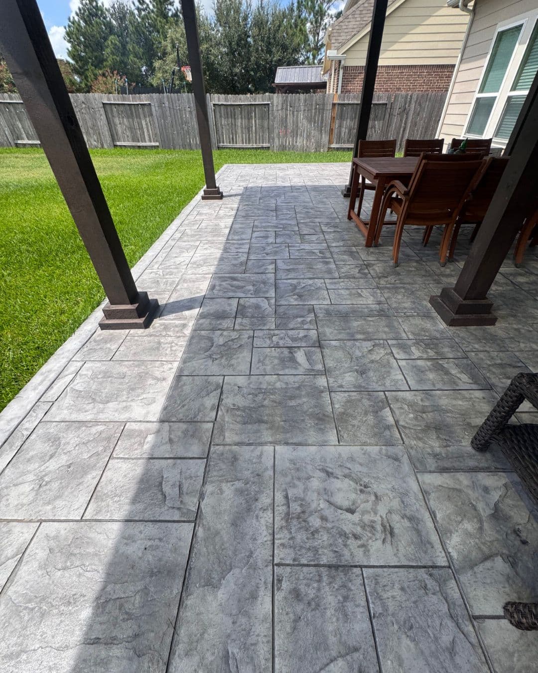 Gray stamped concrete modern patio in Katy